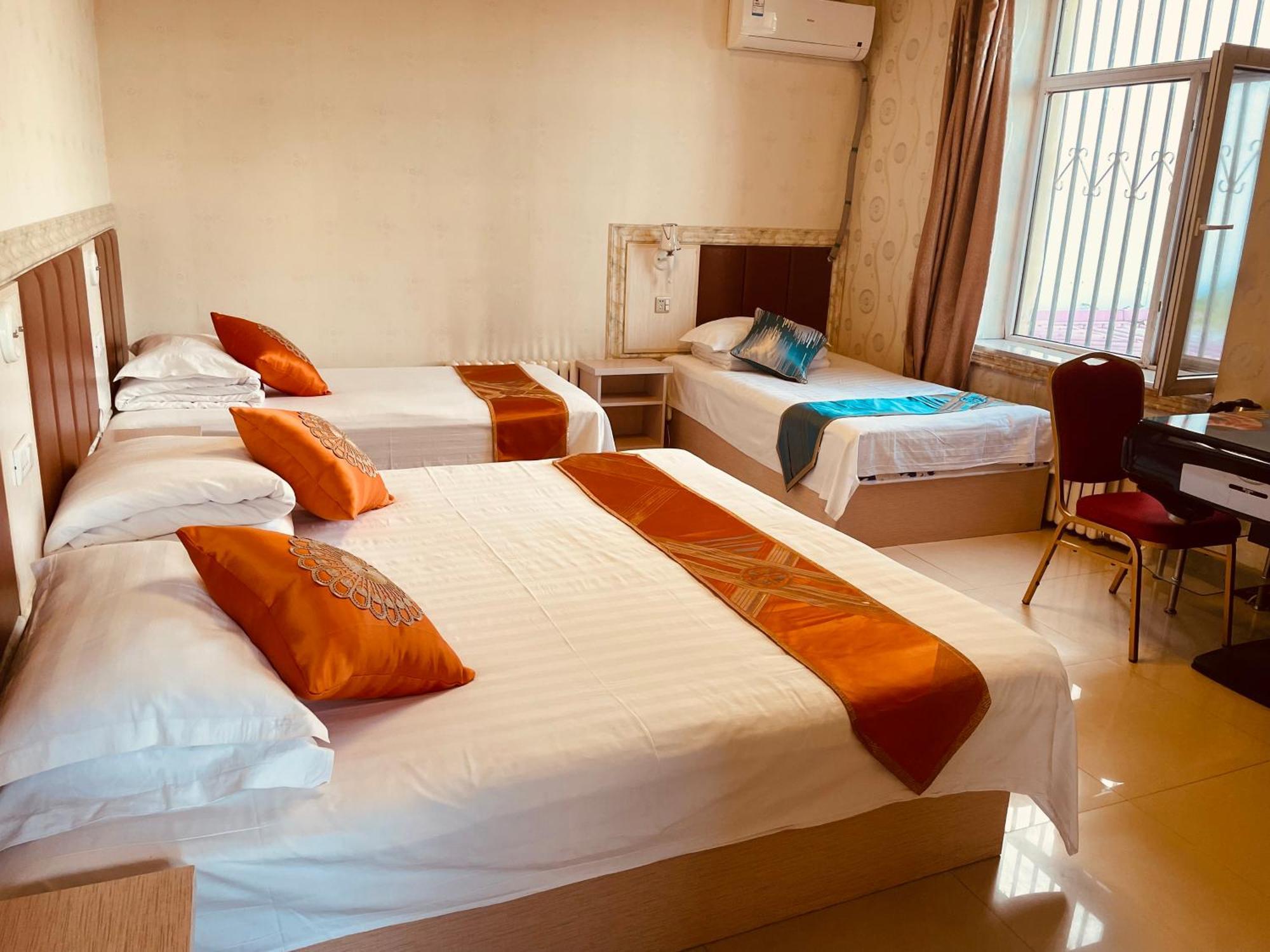 Hotel 哈尔滨机场东方红运宾馆 Zimmer foto