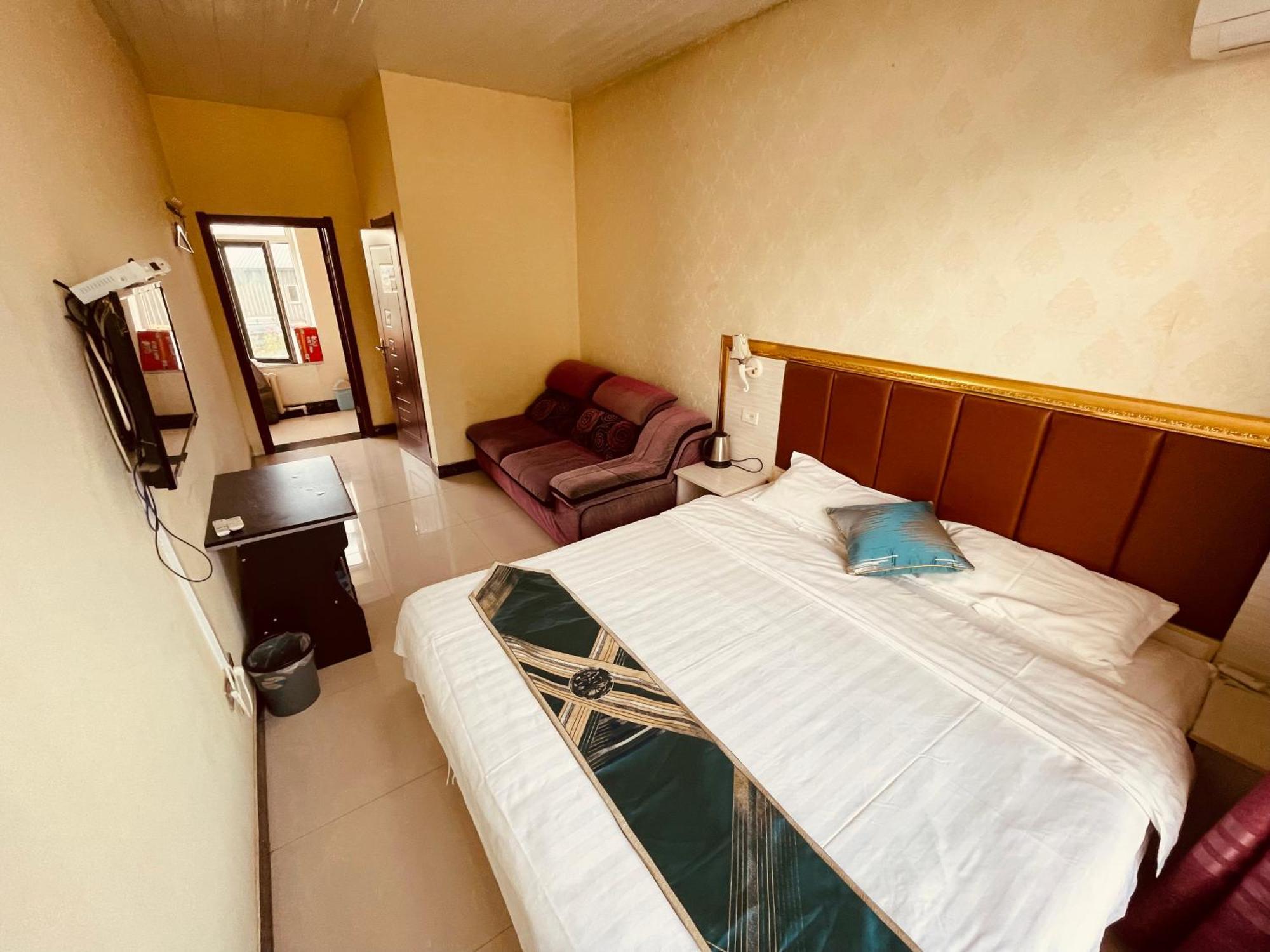 Hotel 哈尔滨机场东方红运宾馆 Zimmer foto