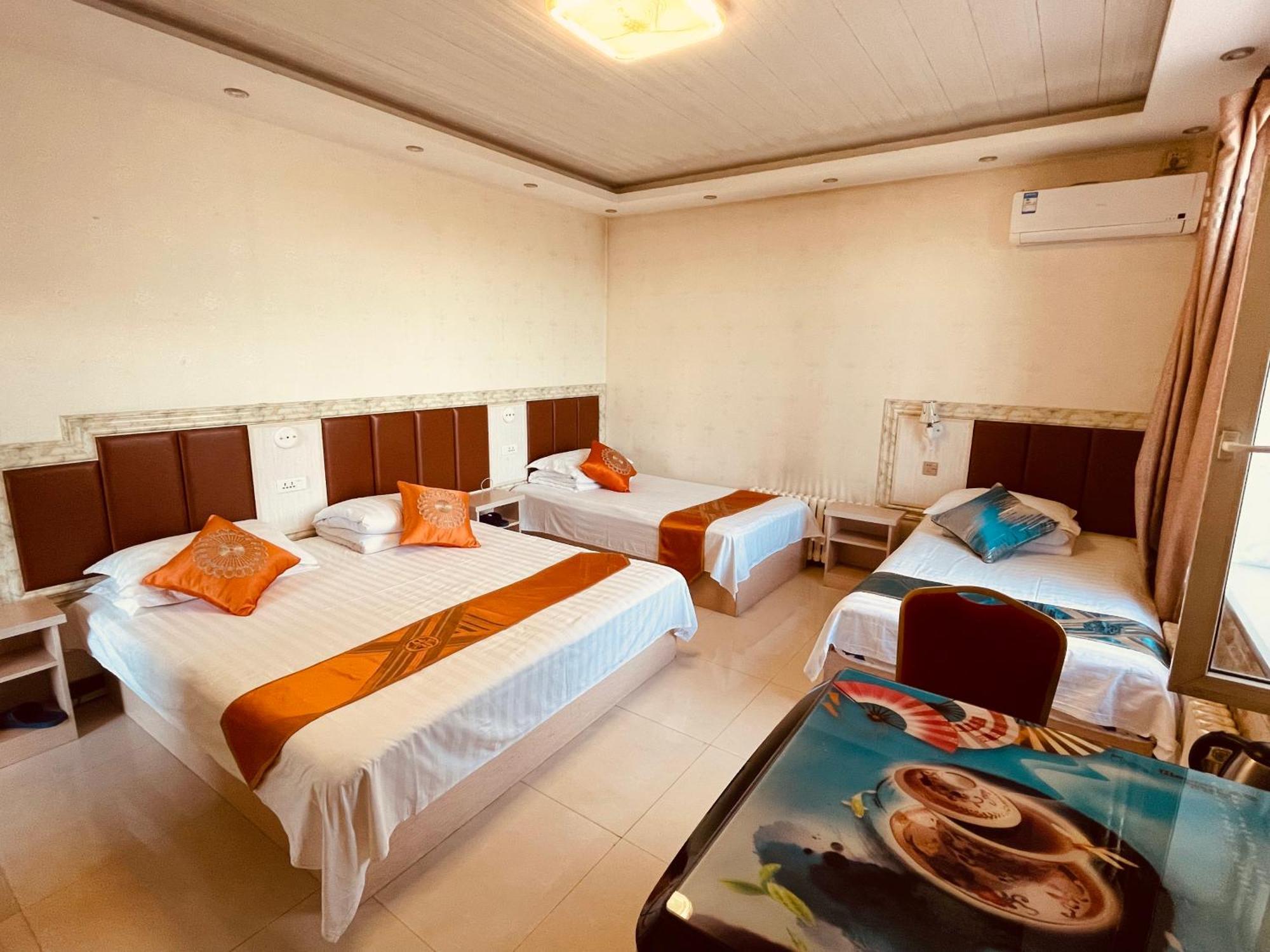 Hotel 哈尔滨机场东方红运宾馆 Zimmer foto