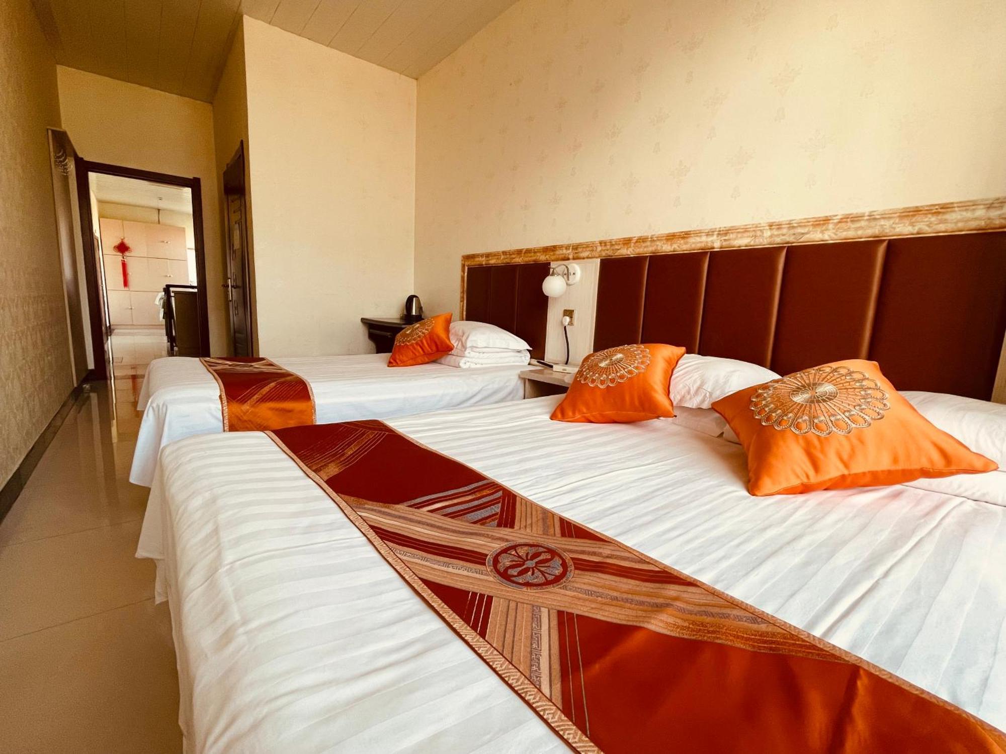 Hotel 哈尔滨机场东方红运宾馆 Zimmer foto