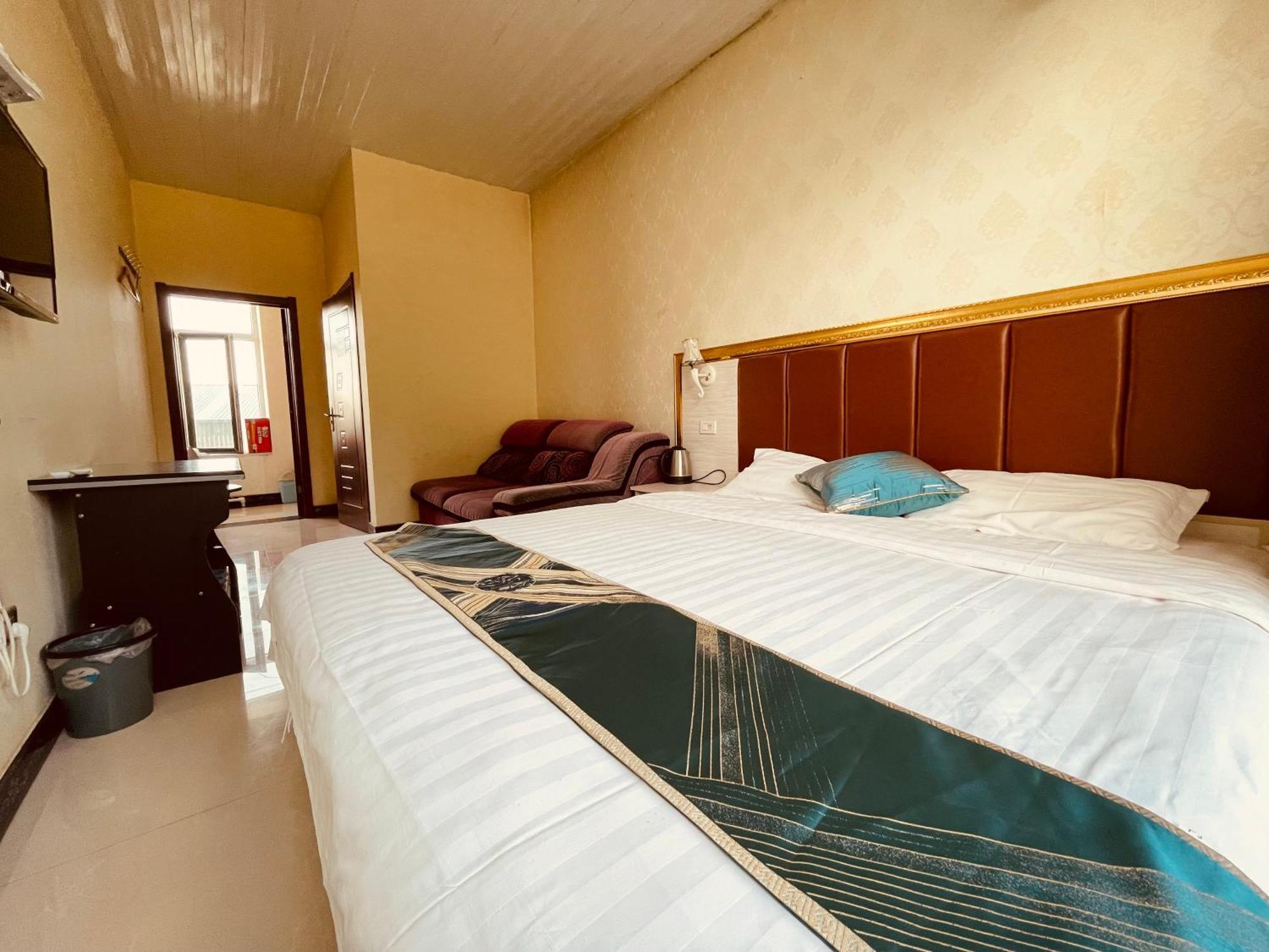 Hotel 哈尔滨机场东方红运宾馆 Zimmer foto