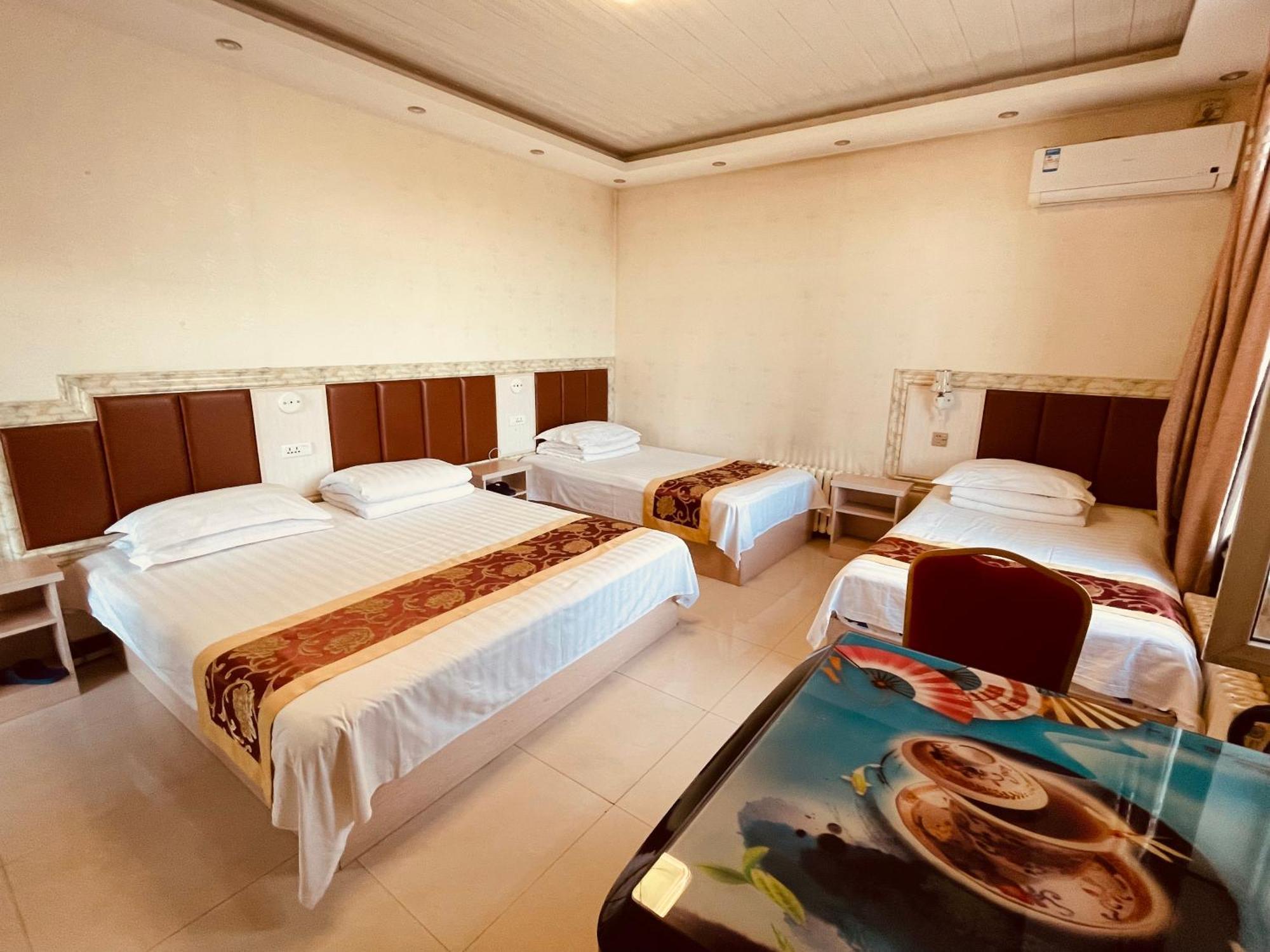 Hotel 哈尔滨机场东方红运宾馆 Zimmer foto