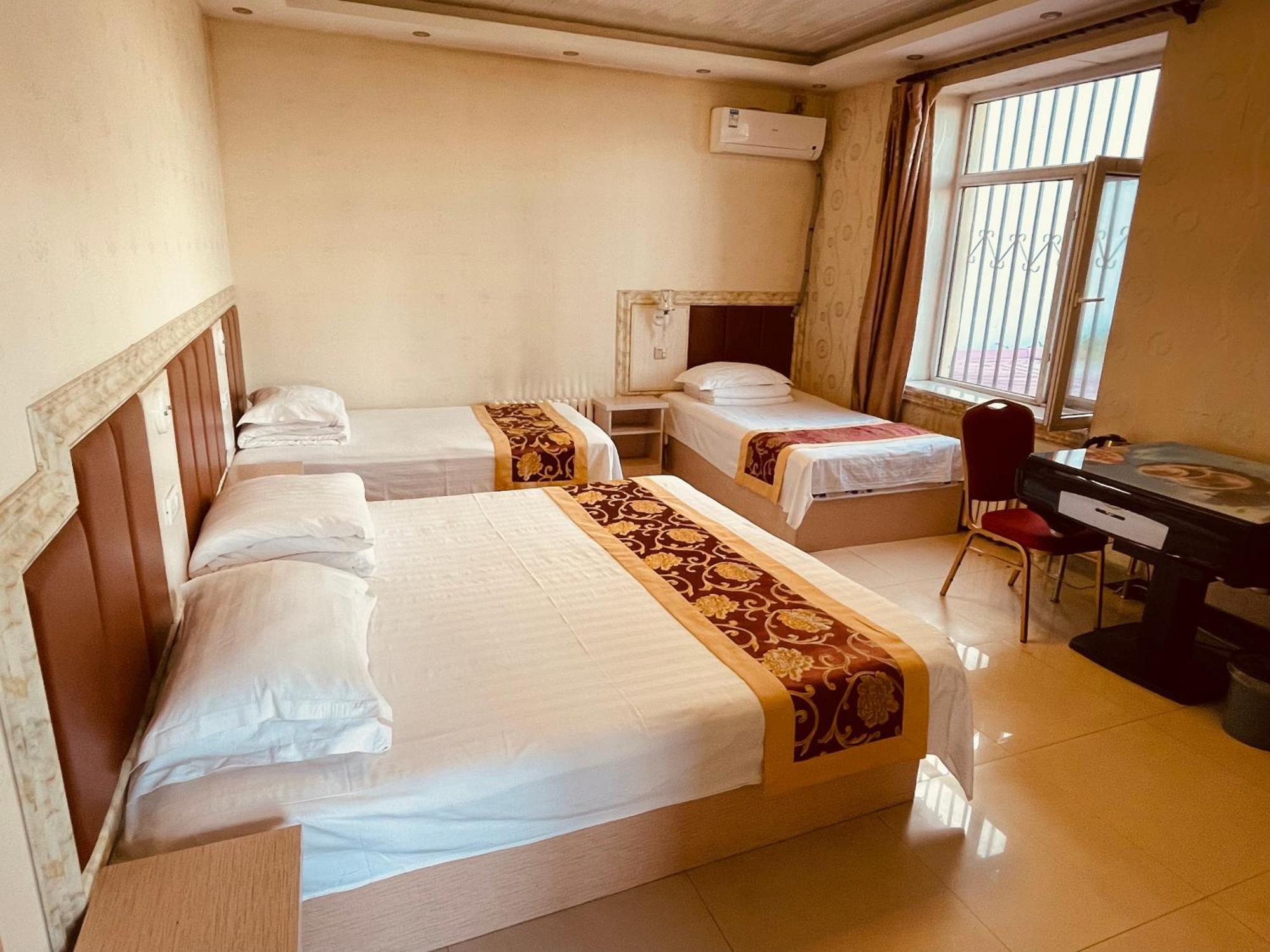 Hotel 哈尔滨机场东方红运宾馆 Zimmer foto